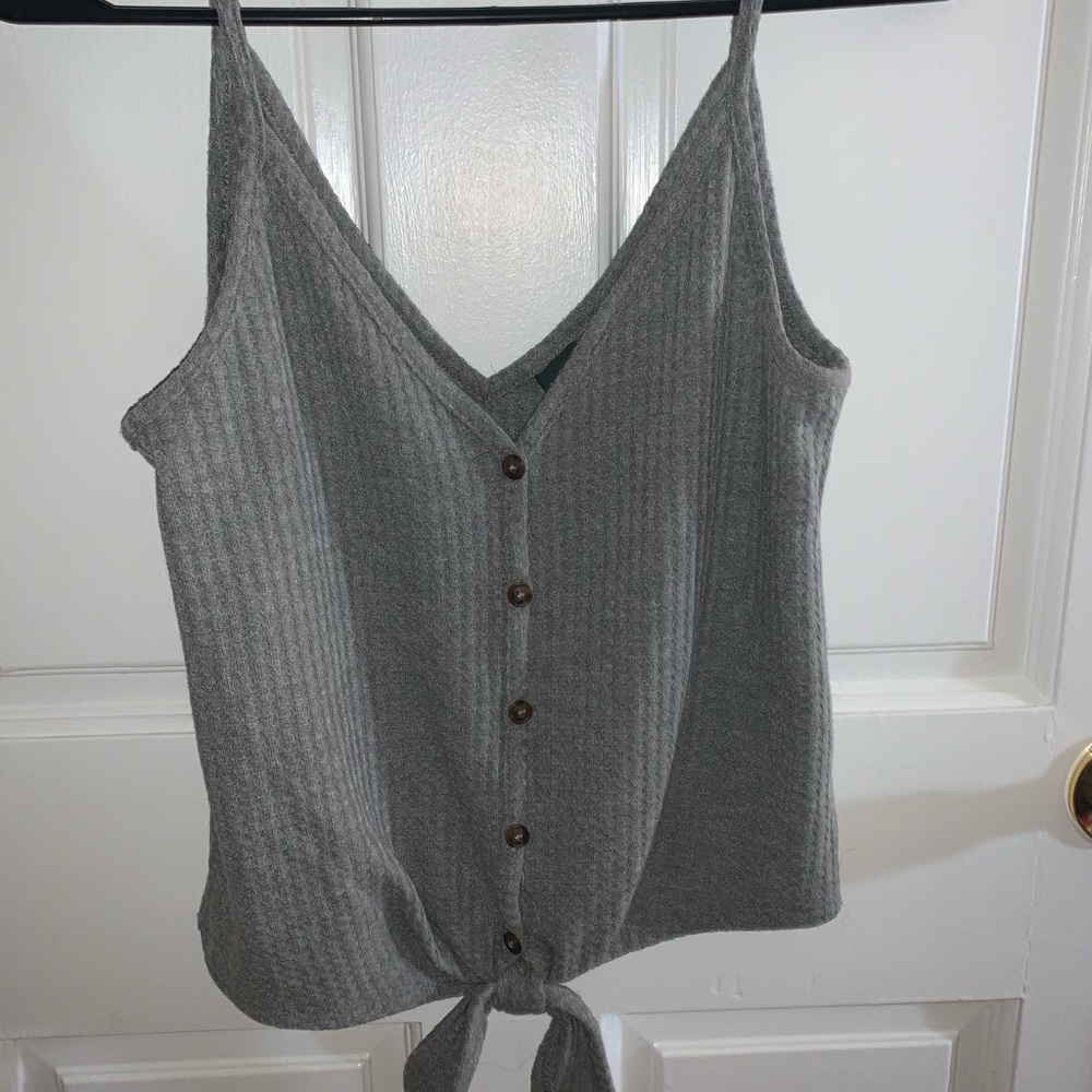 Gray cropped tank top with tie at bottom